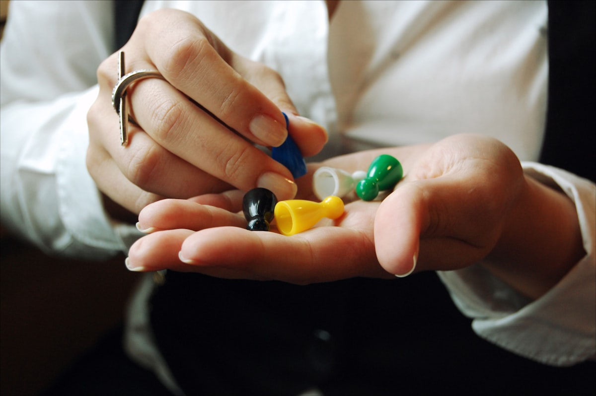 A hand holding pills